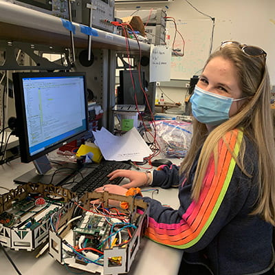 One of the students from Mechatronics Fall 2021 working on the final project