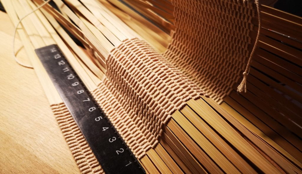 Bamboo reeds woven together by UC Davis research engineer Shuhao Wan may offer a resilient, compostable alternative to fiberglass shells for wind turbine blades. (Courtesy of Valeria La Saponara)