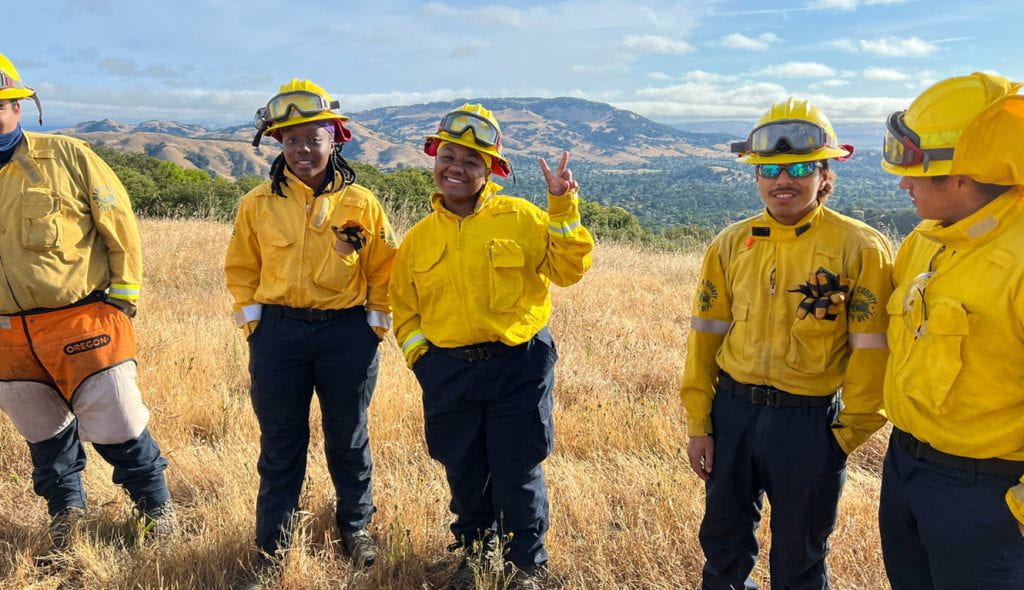 Members of the 2022 FIRE Foundry crew take a break from training at a recent Wildland Academy event. (Photo by Thomas Azwell/Berkeley Disaster Lab)