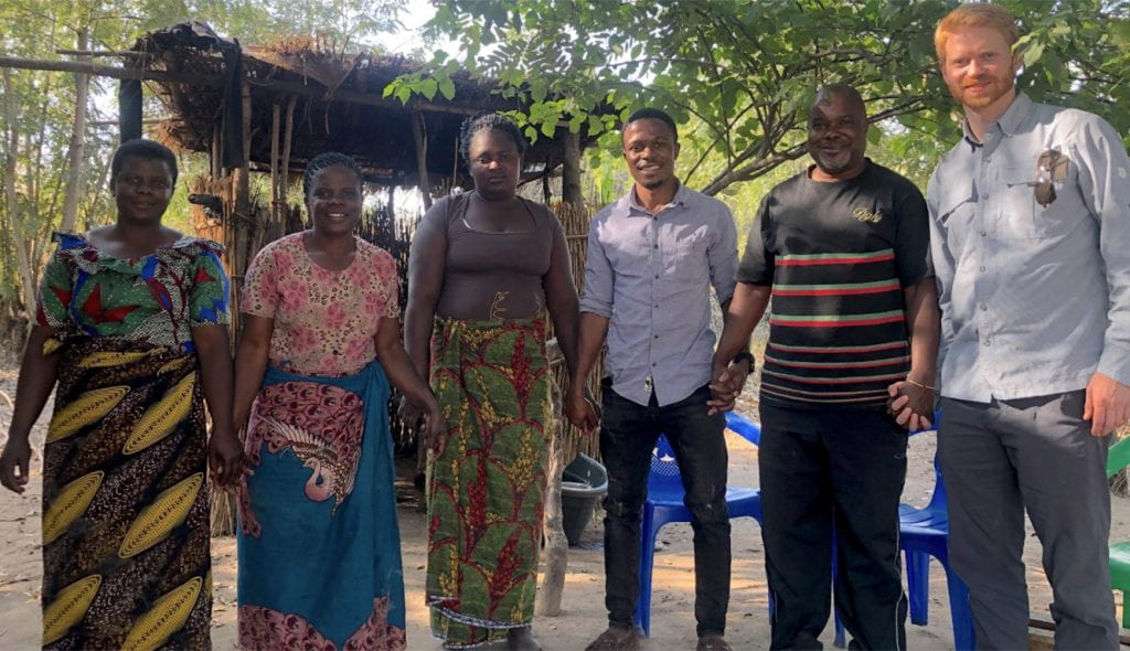 Three of the 11 members of the Yankho women’s co-op (left), the backbone of and inspiration for Umodzi, along with Brian Ndongera (third from right), an advisor to Umodzi, Mathews Tisatayane (second from right), founder and president, and Sean Mandell, co-founder and CEO. (Umodzi photo)
