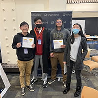 The SlugLoop team during CruzHacks 2023, where they built their first proof of concept and were awarded a “Best Use of Github” prize.